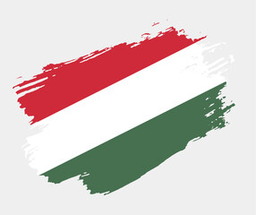 Artistic grunge brush flag of Hungary isolated on white background. Elegant texture of national country flag