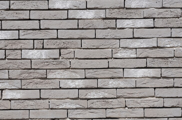 Gray brick wall texture background, stone Facade wall of a new house