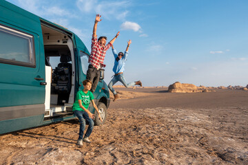 Van life Family playing in a desert 