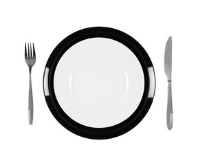 Two stacked black and white plates with fork and knife, overhead top view. Png clipart isolated on transparent background