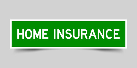 Sticker label with word home insurance in green color on gray background