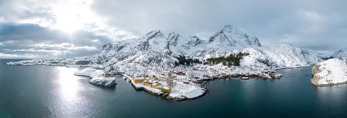 Fototapete Rund Aerial landscape photography. Sunny winter view of Nusfjord town, Norway, Europe. Bright morning scene of Lofoten Islands. Norwegian seascape. View from flying drone. Life over polar circle. © Pavel Kašák