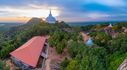 Sunset view of Maha stupa at Mihintale buddhist site in Sri Lanka