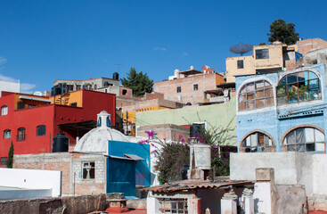 Exterior view of colorful historical old town buildings in the downtown of Guanajuato state, Mexico. Vivid, multicolored colonial neighborhood with traditional Mexican architecture.