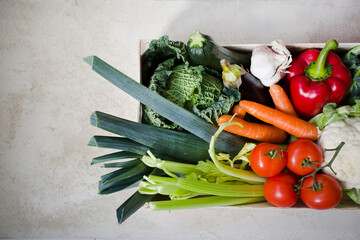 various vegetables over grey stone background