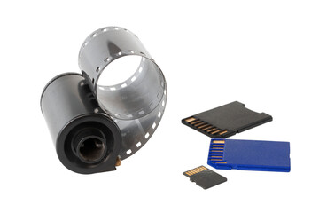 Micro SD card against vintage roll film in reel, on isolated background