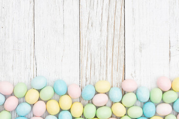 Easter egg background of pastel color candy