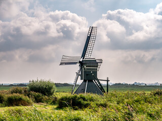 Small drainage polder windmill in Geeuwpolder, Friesland, Netherlands