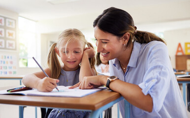 Teacher, learning and helping girl in classroom for drawing, studying or assessment. Teaching,...