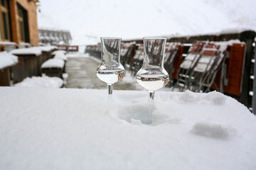 2 shots of schnapps in the snow