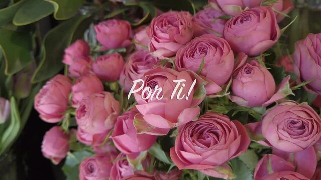 4k video of bouquet of roses with text flying in "¡Por Ti!" in Spanish language, meaning "For you!"