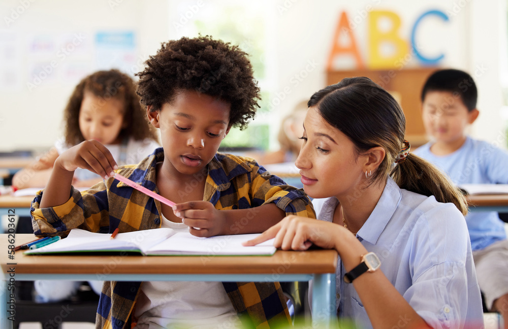 Wall mural Teacher, learning and helping black kid in classroom for knowledge, studying or assessment. Teaching, development and boy or student with woman for education answer in notebook in kindergarten.