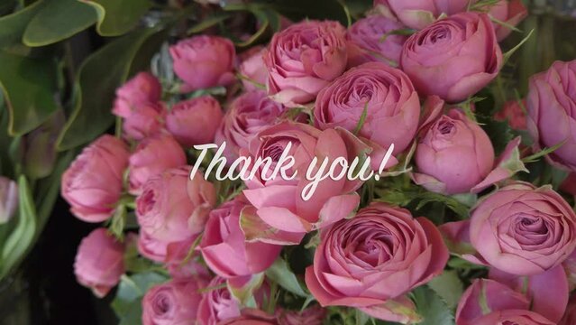  Bouquet of roses with text flying in "Thank you!" romantic concept