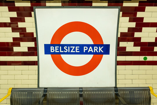 London- Belsize Park Underground logo on platform, Northern Line tube station