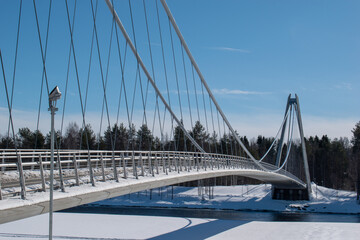 Umea, Norrland Sweden - March 26, 2023: the Lundabron on a sunny winter day. By the Umea River.