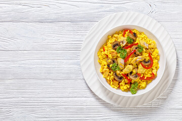 Chicken Paella with mushrooms, red pepper, spices