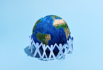 Earth globe with paper men