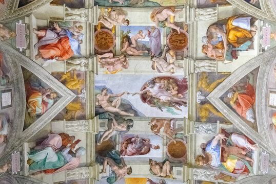 The Creation of Adam by Michelangelo on the ceiling of the Sistine Chapel in the Vatican Museum, Rome, Italy
