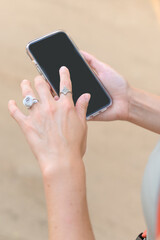 Unrecognizable Woman Hand using smartphone