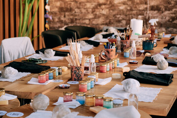 paints and brushes for ceramics, pottery master class