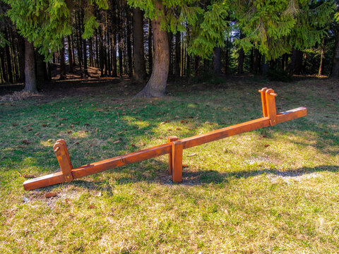 Wooden Seesaw At Outdoor Playground