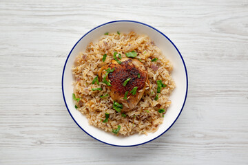 Homemade Paprika Chicken and Rice on a Plate, top view. Flat lay, overhead, from above.