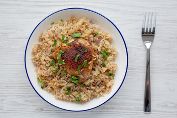 Homemade Paprika Chicken and Rice on a Plate, top view. Flat lay, overhead, from above.