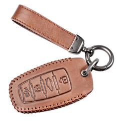 Remote Flip Key is placed in a cow leather case. small brown handbag for key isolated on white background. clipping path