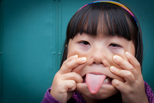 Young asian girl many all kinds of faces