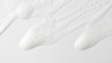 Abstract background white soapy foam texture. Shampoo foam with bubbles