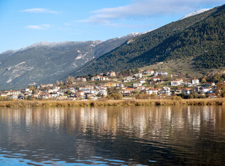 Fototapeta na wymiar Ioannina city Pamvotis Lake, Epirus Greece. Destination Giannena, blue sky background.
