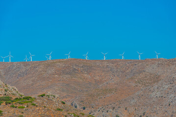 Wind turbines at Greek island Crete - obrazy, fototapety, plakaty