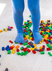 The child plays as a constructor. Selective focus.