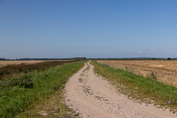 Fototapeta premium Unpaved highway in rural areas
