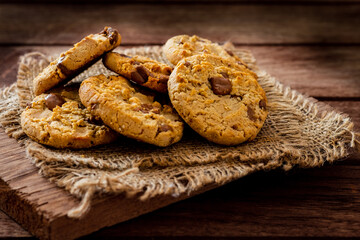 Chocolate chip cookies on burlap napkin
