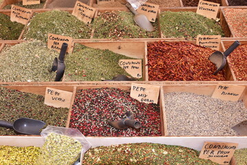 various colours of different spices,market in town Syracuse,Sicily