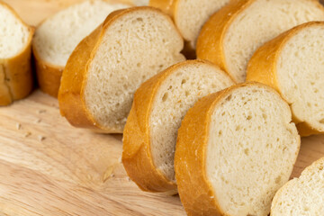 Sliced soft French baguette made of wheat flour