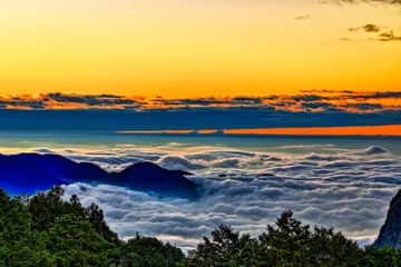 Poster Fascinating,vast sea of cloud and mountain scenery at sunset,clear golden sky,scenic dreamy view. Alishan ,Chiayi,Taiwan.for branding,calender,postcard,screensave,wallpaper,website.High quality photo © 林智遠 