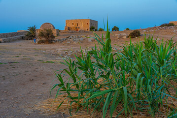 Sunset view of Venetian Fortezza Castle in Greek town Rethimno, Crete