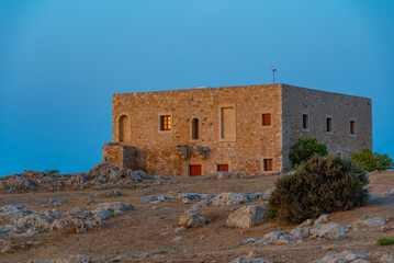 Sunset view of buildings at Venetian Fortezza Castle in Greek town Rethimno, Crete