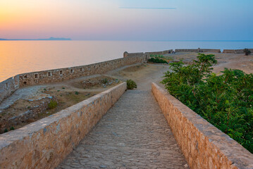 Sunset view of Venetian Fortezza Castle in Greek town Rethimno, Crete