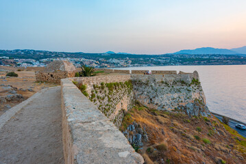 Sunset view of Venetian Fortezza Castle in Greek town Rethimno, Crete