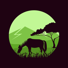 vector silhouette of a horse eating grass under a tree with mountains background, flat style design 