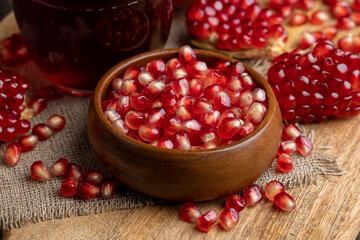 Red pomegranate ripe and lying on the table