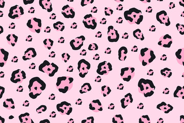Seamless pattern with abstract leopard print. Black spots on pink backdrop. Vector animal texture for fabric and textile