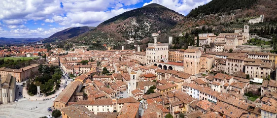 Poster Aerial drone panoramic view of medieval town Gubbio in Umbria.  Italy travel .great historical italian landmarks and best tourist destinations © Freesurf