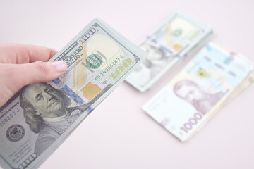 American dollars and Ukrainian hryvnia. The concept of the exchange rate.