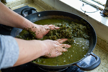 Fototapeta premium Herbs needed to make five-color glutinous rice, a traditional Chinese Tomb-sweeping Day food