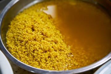 The process of making five-color glutinous rice, a traditional food for the Chinese Ching Ming Festival