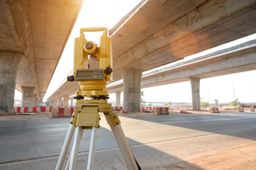 theodolite on construction site Surveyor Engineer uses theodolite to mark coordinated concrete...